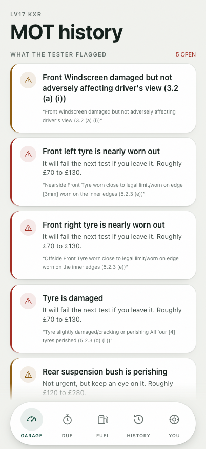 Motorfile on iPhone: MOT advisories translated, with nearside front tyre shown as front left tyre is nearly worn out.